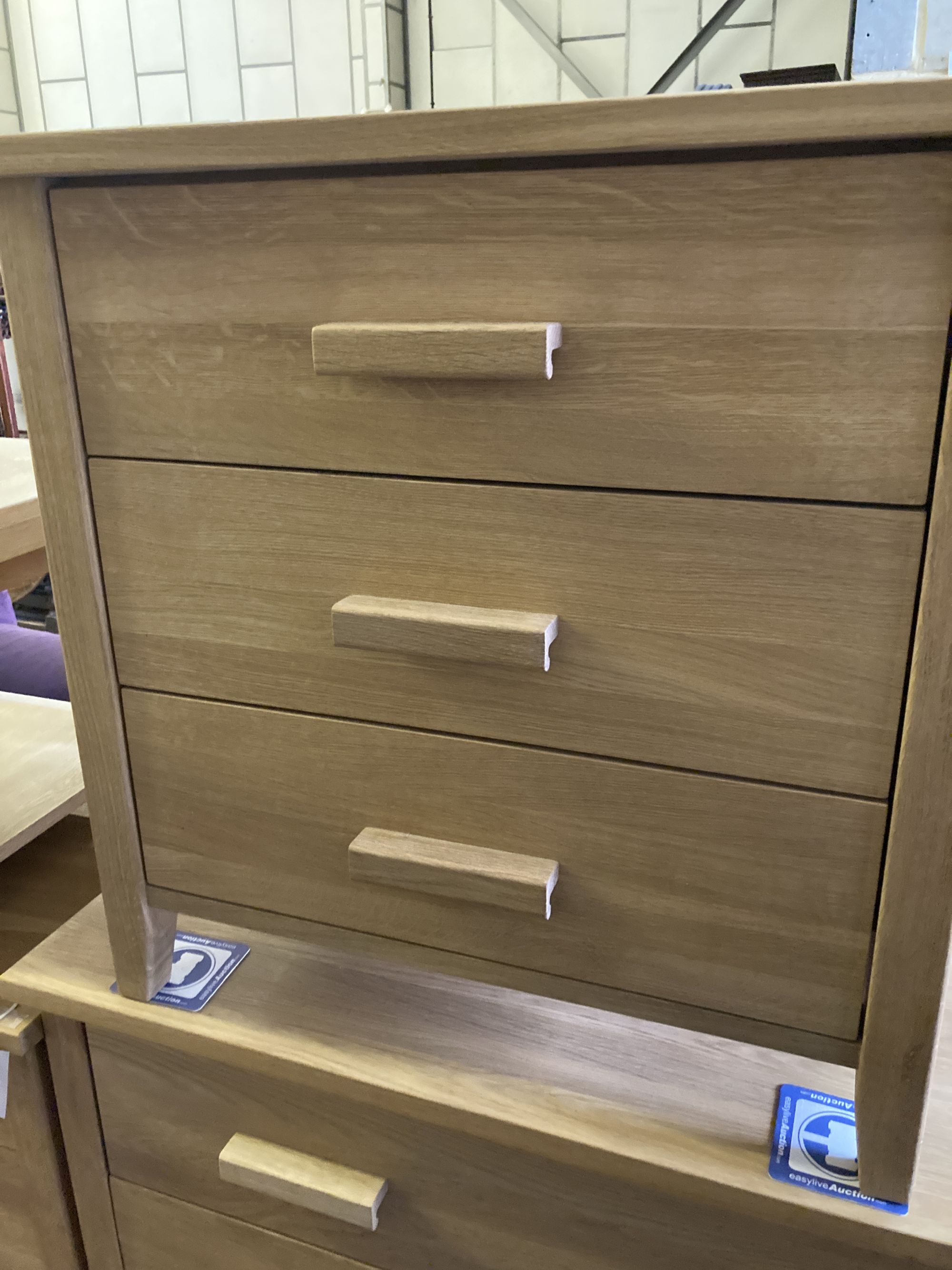 Two modern contemporary oak three-drawer chests, larger width 105cm, depth 45cm, height 77cm